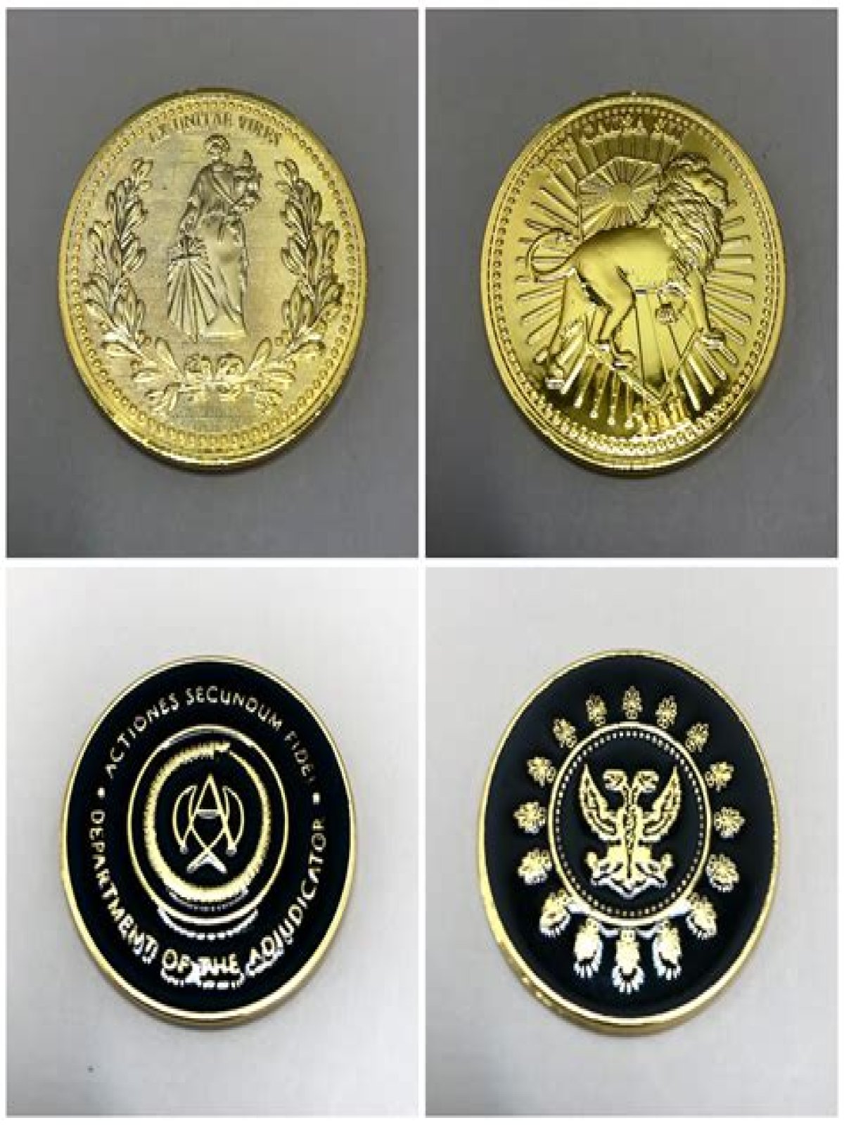 What does the adjudicator coin say?